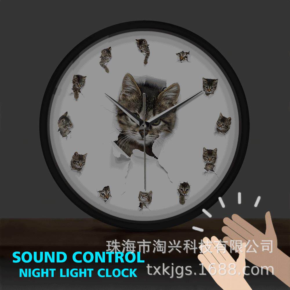 破纸而出的宠物小猫声控感应挂钟LED灯光时钟爱猫者家居装饰墙钟
