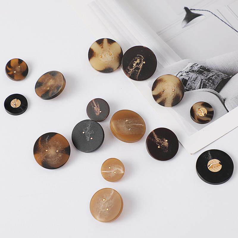 新款树脂花纹纽扣平面磨砂仿牛角扣男女风衣西装羊绒毛呢大衣扣子