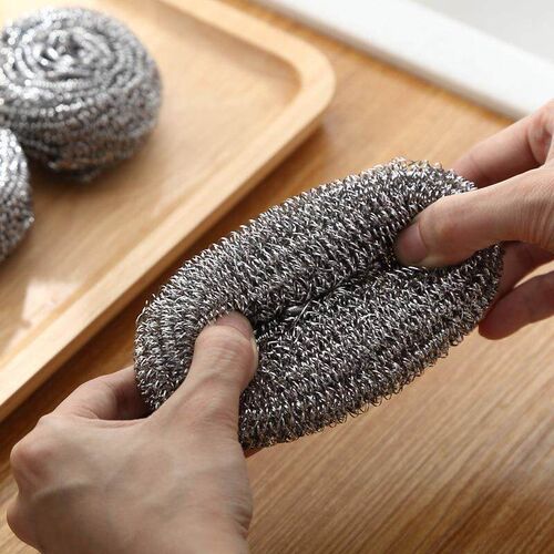 A set of 6 steel wool scrubbing balls for kitchen use, ideal