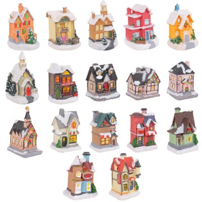 Christmas decorations, colorful glowing house tabletop