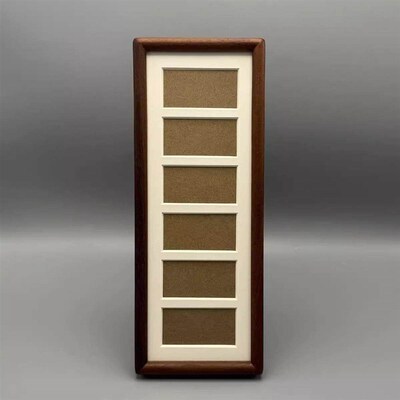 Six-panel black walnut photo frame, believed to bring fortun