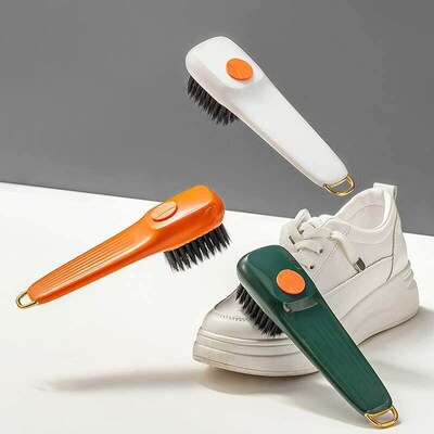 Long-handled shoe brush with soft bristles, color-contrastin
