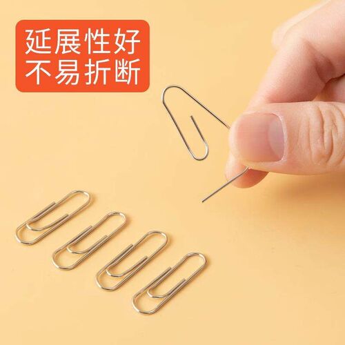 Paperclips, office supplies, binder clips, U-shaped pins, an
