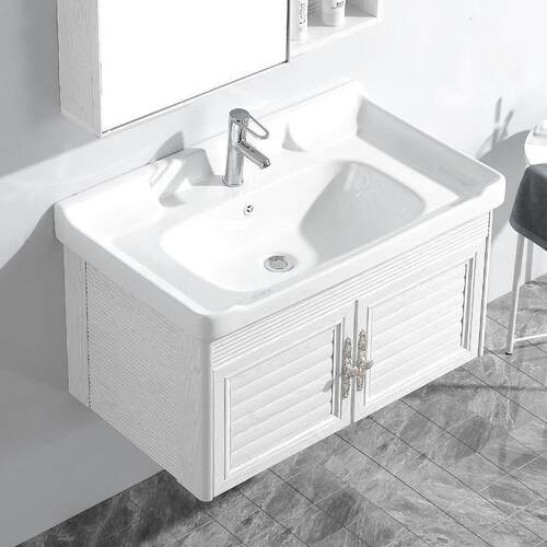 Wall-mounted wash basin and bathroom cabinet combination