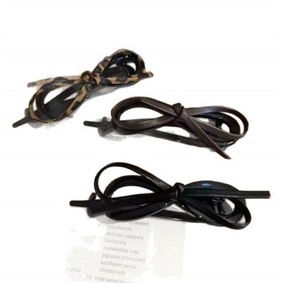 Leather bow twist clip, exuding elegance and sophistication
