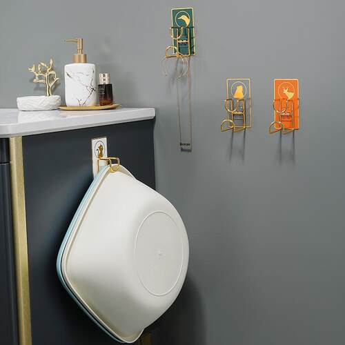 A no-drill, wall-mounted bathroom basin organizer with a lux