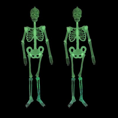 Spooky glow-in-the-dark skeletons decorated for Halloween