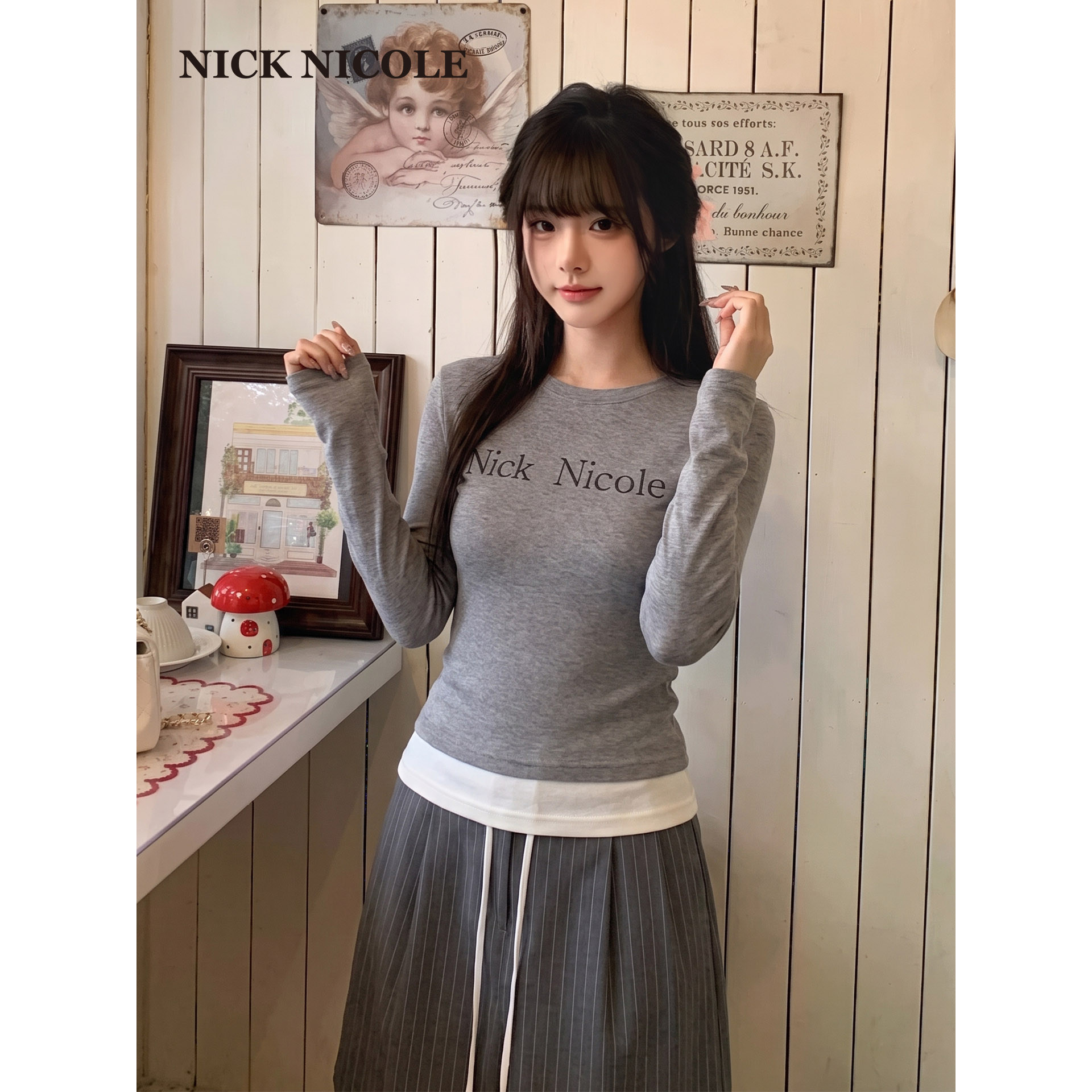 NICK&NICOLE2026年新款韩版时尚底摆拼接长袖打底衫修身休闲潮流