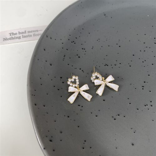 2023 New Simple Enamel White Bow Ear Clip on Earrings Female