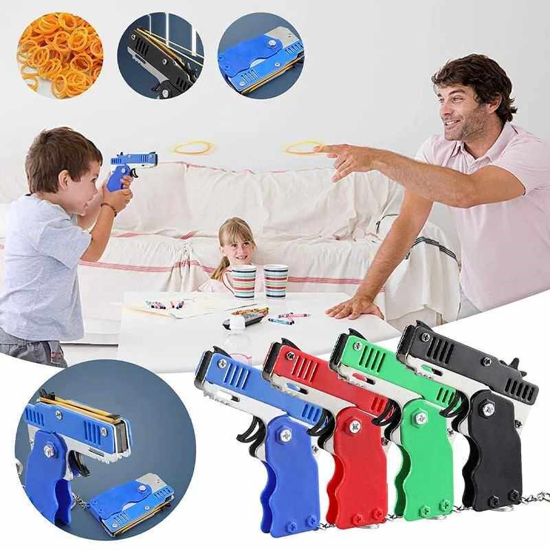 1PC Mini Keychain Gun Rubber Band Gun Toy Gun Shooting Pisto