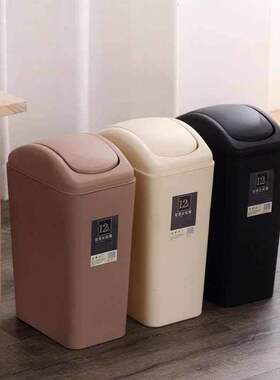 Black dustbin with cover and cover toilet paper to put in