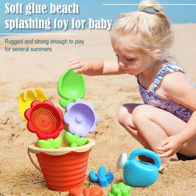 Childrens beach toys, playing with sand, digging an hourgla
