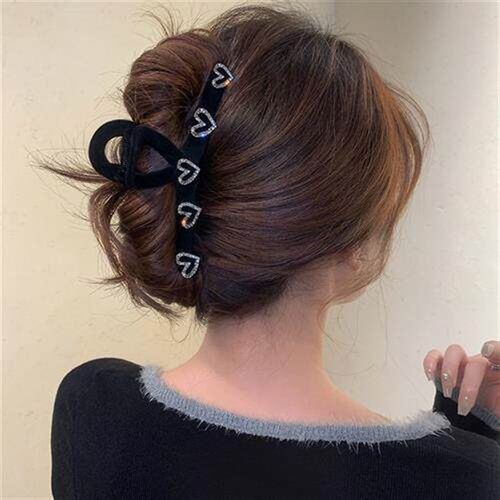 Ive got a big hairpin on the back of my head and a high hor