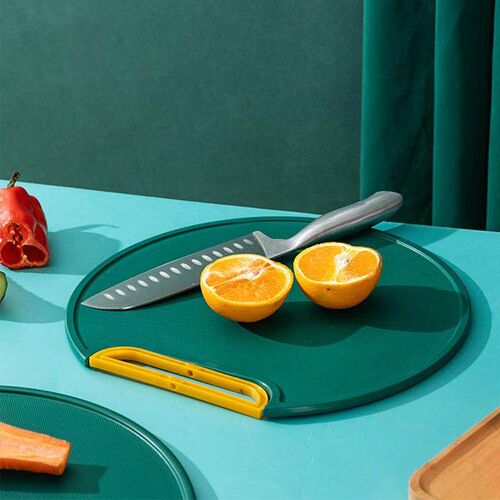 Round plastic cutting board for the kitchen, designed to be