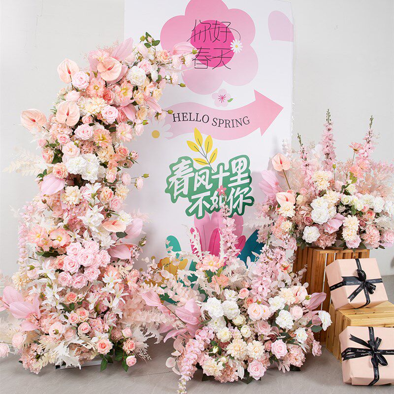 粉色彷真花婚礼活动场景摆花舞台展位拱门花架路引地花排花假花