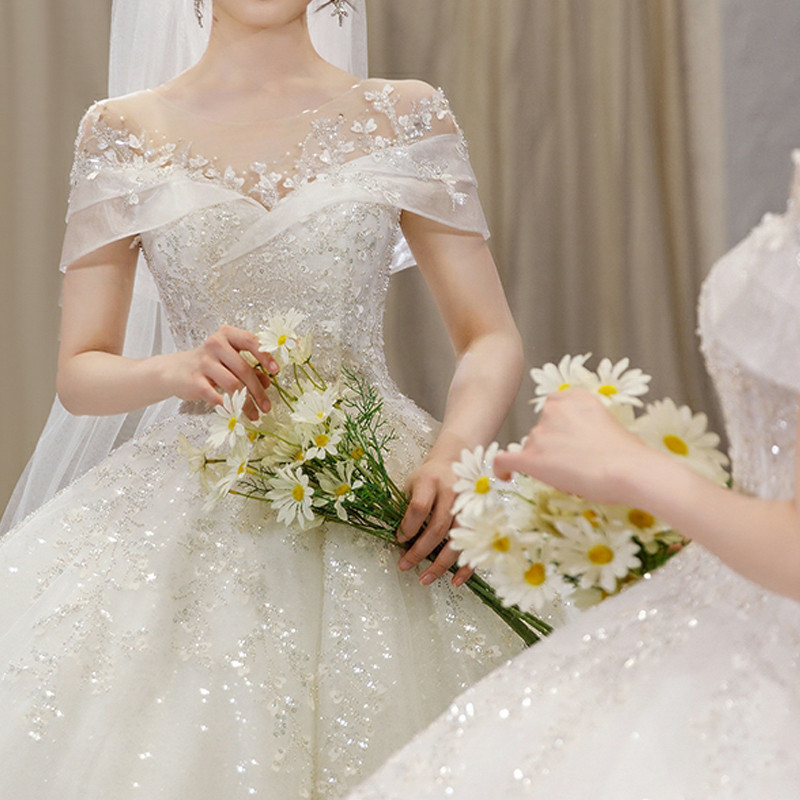主婚纱2021新款新娘大拖尾奢华一字肩气质遮粗手臂孕妇法式小个子