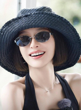 老钱风偏光冷茶黑椭圆墨镜女