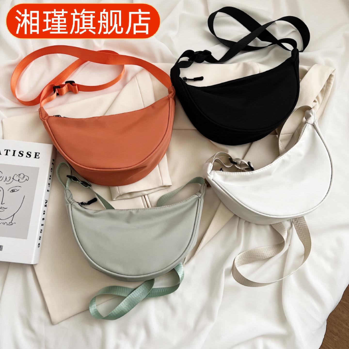 尼龙斜挎包女新款潮饺子包轻便小