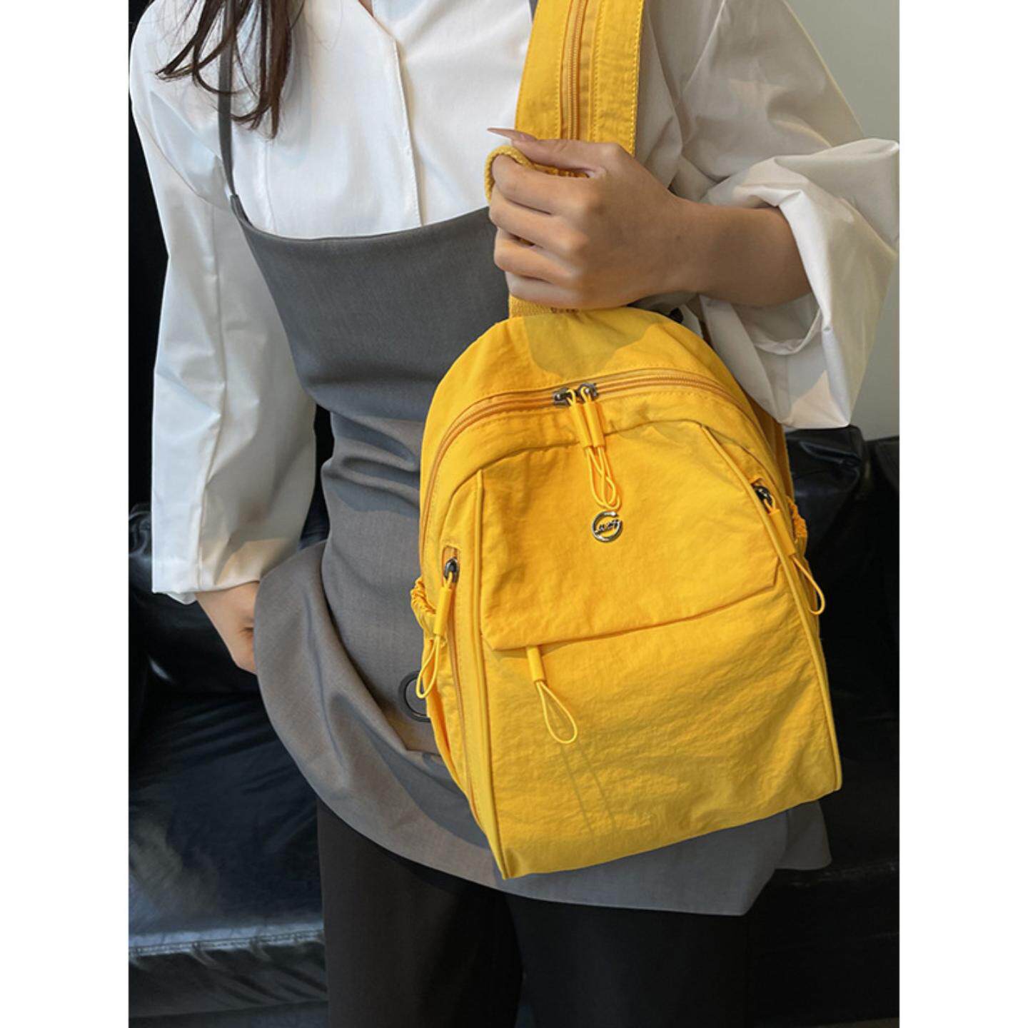 双肩包超轻2026新款高级感小众尼龙帆布上班通勤旅行背包小型轻便