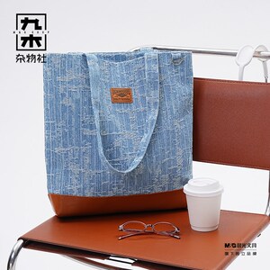 九木杂物社牛仔布斜挎包女大容量包包复古邮差帆布单肩包出行包袋