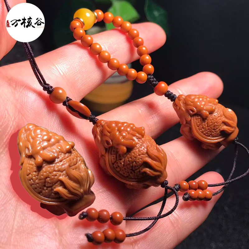 新款橄榄核雕刻龙龟手捻挂件老型油核文玩把件苏工橄榄核龙龟挂件图片