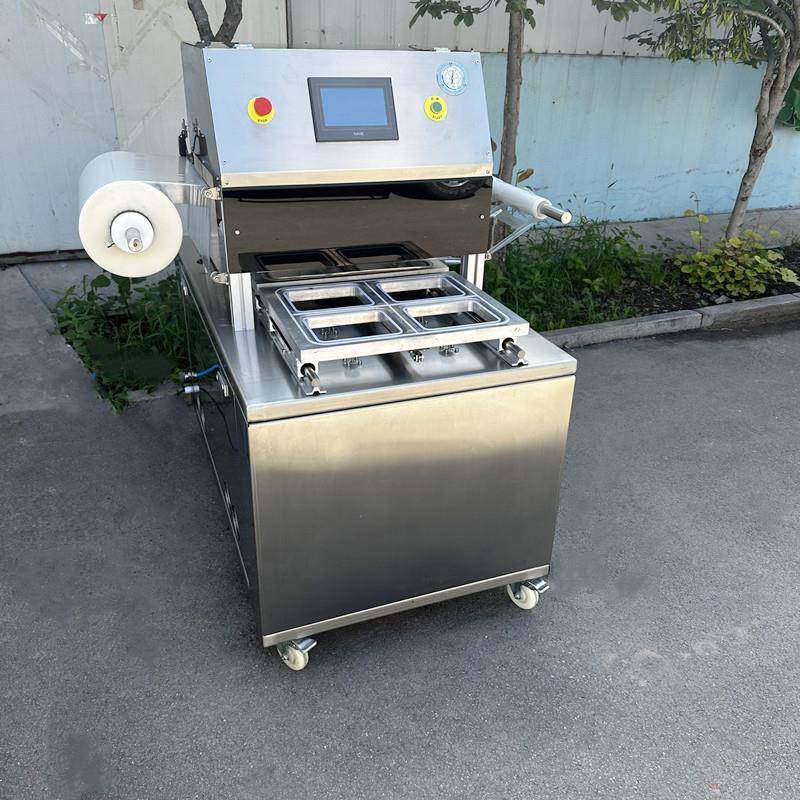 金迈成羊肉卷真空贴体 保鲜机无骨鸡爪真空膜机 酱菜式贴台体包装