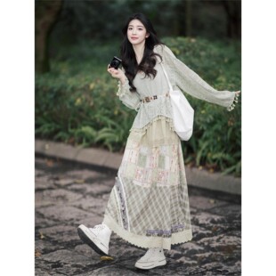 波西米亚早秋穿搭套装 度假风流苏镂空上衣半身裙两件套 女2025新款