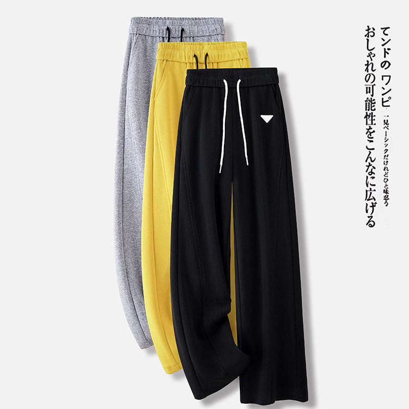 黄色休闲直筒裤女2025新款春秋季高腰运动卫裤宽松垂感窄版阔腿裤