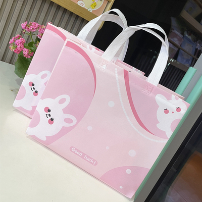 新款兔年防水无纺布礼品手提包装袋衣服女装服装店购物袋子定制