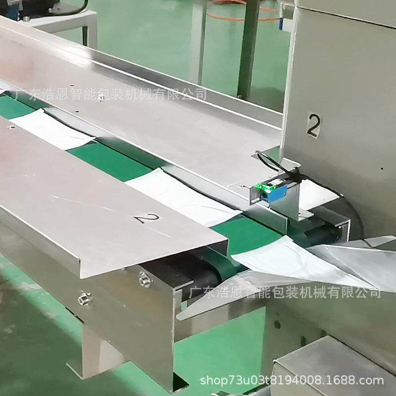 佛山浩恩供应食品浩恩式包装机包 自动面包枕包装机带拖盒装设