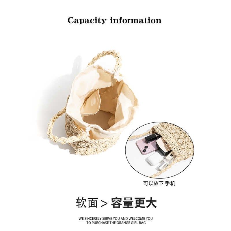橙子少女法式手工编织包2024新款夏季草编包海边度假沙滩水桶包