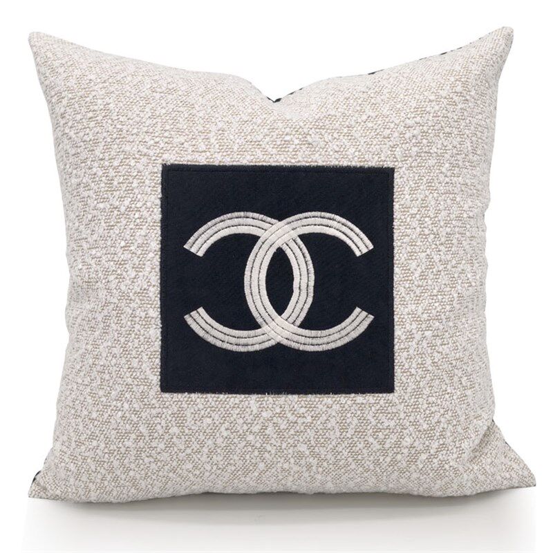 黑色现代简约轻奢高级感沙发抱枕编织纹理拼接PU黑白雪尼尔蝴蝶结