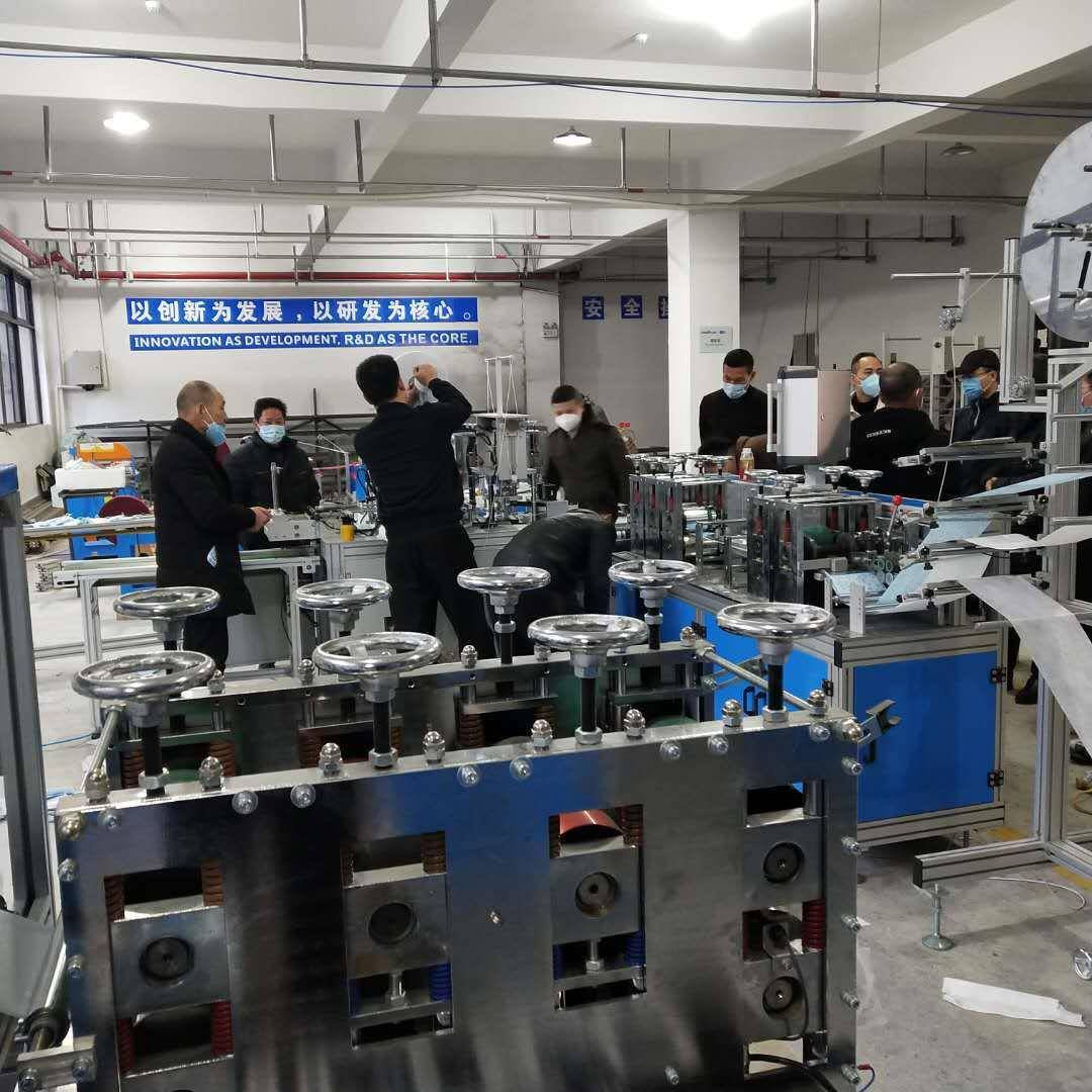 自JS-1950-动一次性平面口罩一拖全内包边机口一罩机