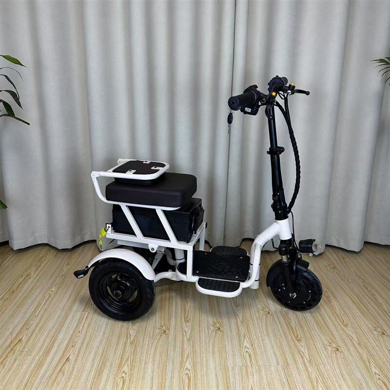 小臻电动车一体三轮车小型电动代步老人折叠车迷你家用便携电车