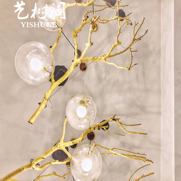 干树枝造景原木干枝酒店橱窗设计枯枝真树枝墙面装饰吊灯树枝装饰图片