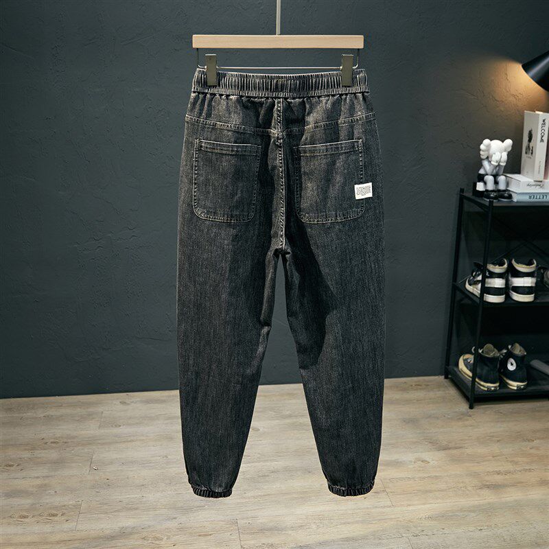 黑灰弹力松紧腰牛仔裤男款宽松大码束脚裤春季薄款休闲哈伦九分裤
