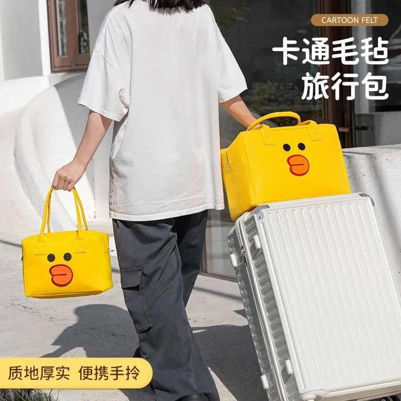 卡通包旅行包收纳手提包大容量儿童行李袋拉杆箱行李包毛毡包轻便
