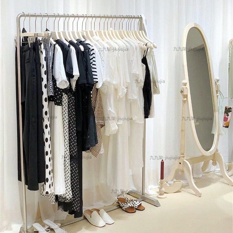 服装店衣架展示架落地式金色侧挂中岛陈列架女装店货架装修效果图