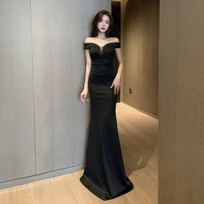 名媛高级感时尚一字领露肩修身晚礼服女夜场鱼尾裙性感黑色连衣裙