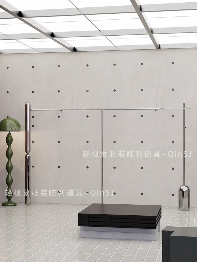 服装店上墙架展示架陈列架挂衣架道具不锈钢圆柱挂架衣买手店货架图片