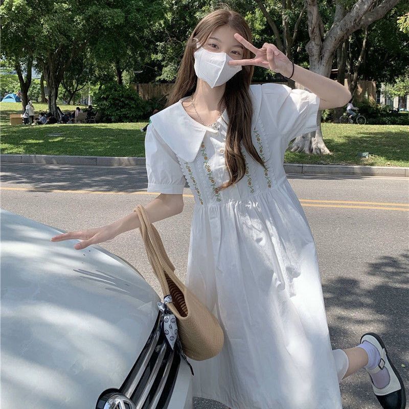 初中生甜美中长裙子夏时尚少女高中学生宽松显瘦娃娃领过膝连衣裙
