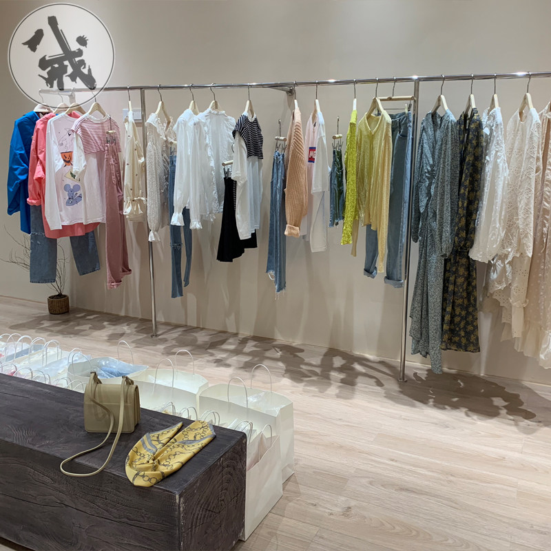 服装店衣架展示架上墙壁挂式挂衣杆童装装修设计效果图女装店货架