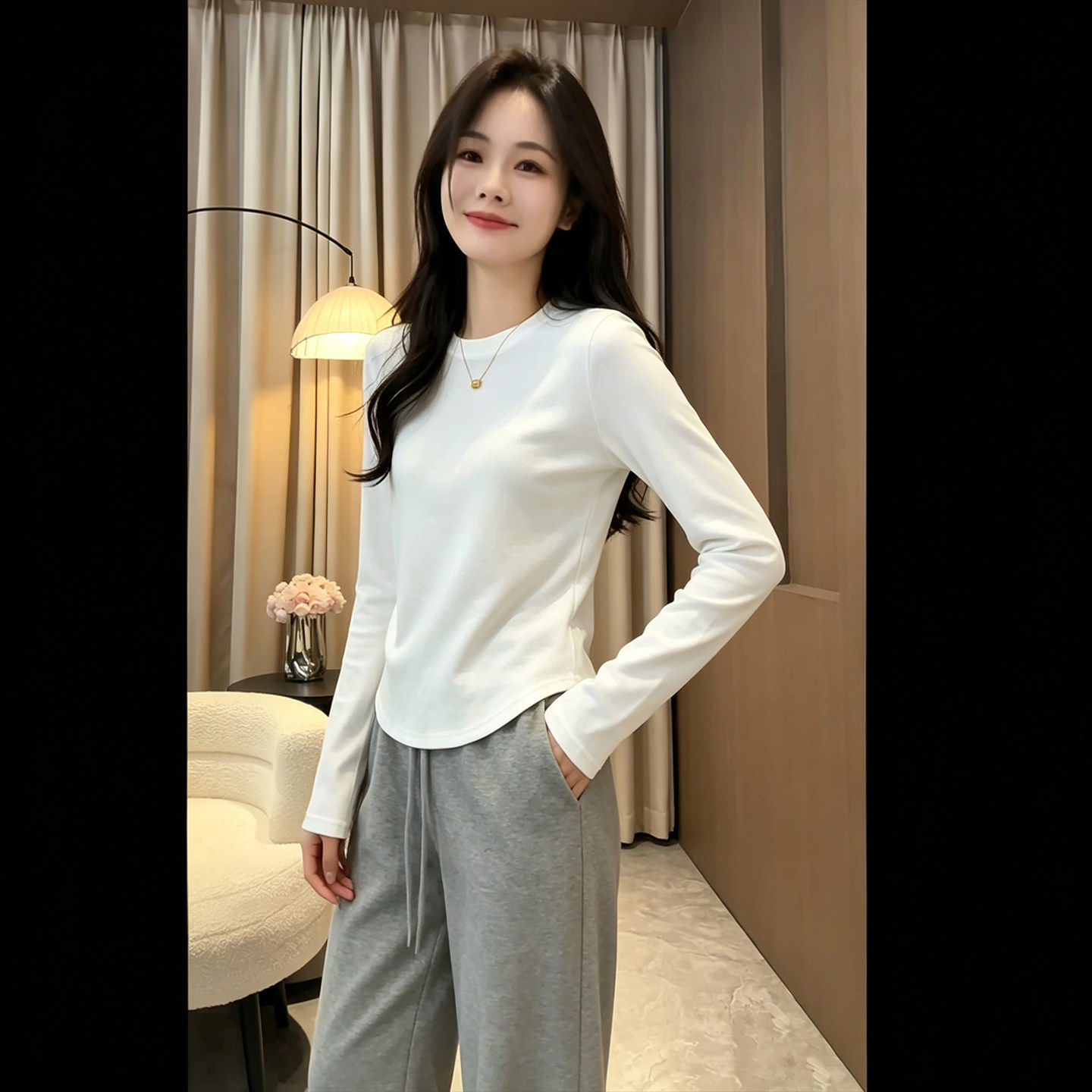 白色长袖弧形下摆T恤女秋新款