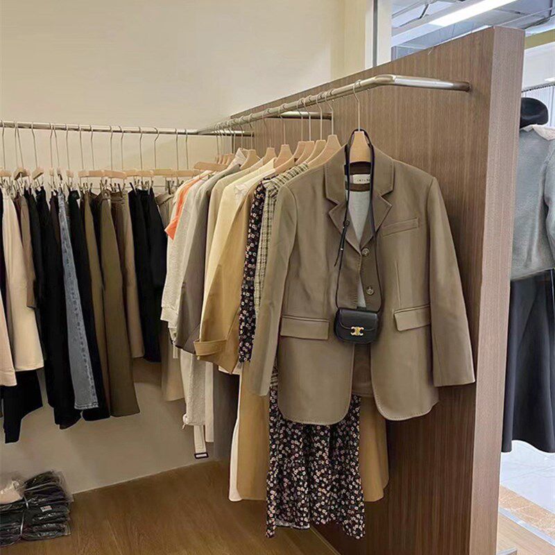 服装店上墙陈列架女装展示架不锈钢货架预埋式挂衣杆衣架道具定制