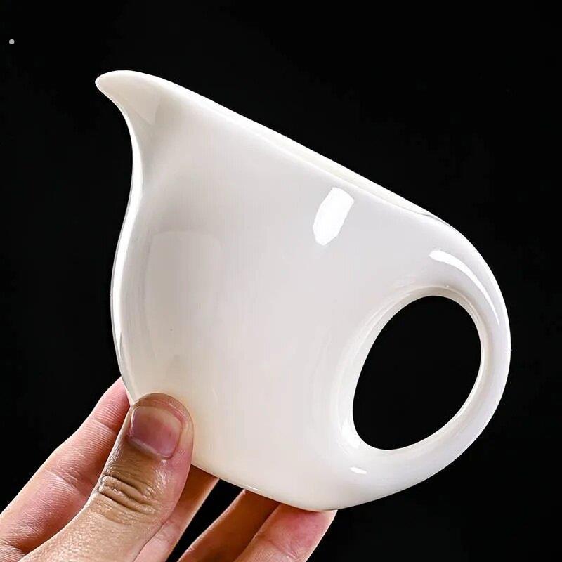 羊脂玉白瓷公道杯茶海单个陶瓷分茶器贪心杯公平杯带手柄装茶器