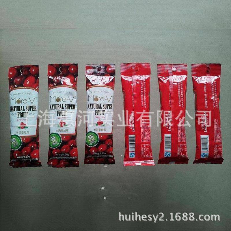 供应小拖斗包装机不规则食品物料包装机小麻花红糖麻花包装机