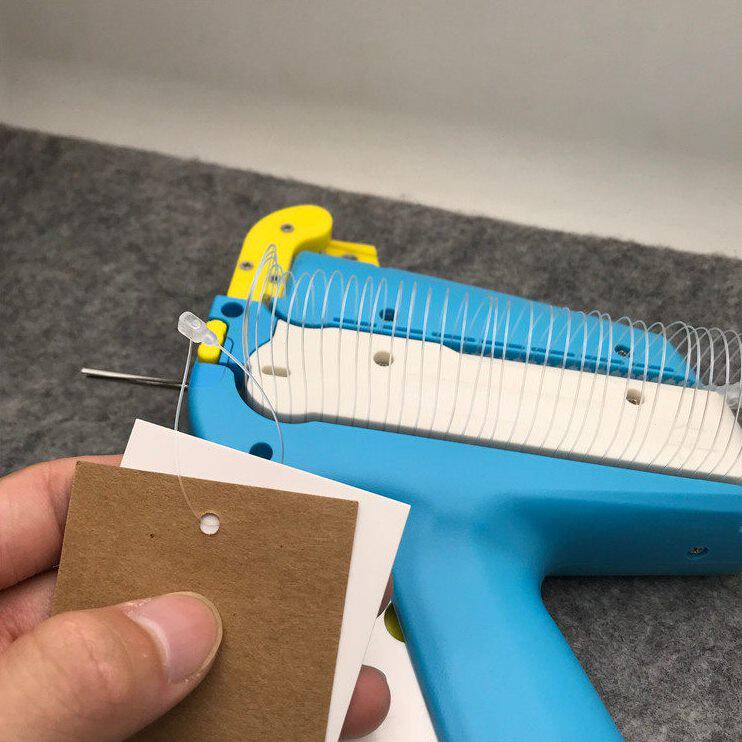 甄选国产套环枪打子母扣手穿针纸卡服装餐具服饰玩具雨伞挂吊牌绳