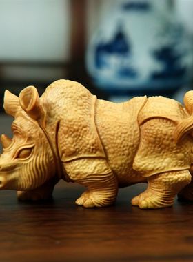 黄招木雕摆件犀牛手把件通灵神兽动物实木中杨家居装饰式财工艺品
