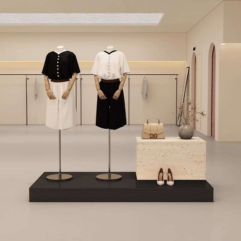 服装店展示柜简约现代中岛台洞石纹女装陈列柜橱窗地台摆放模特