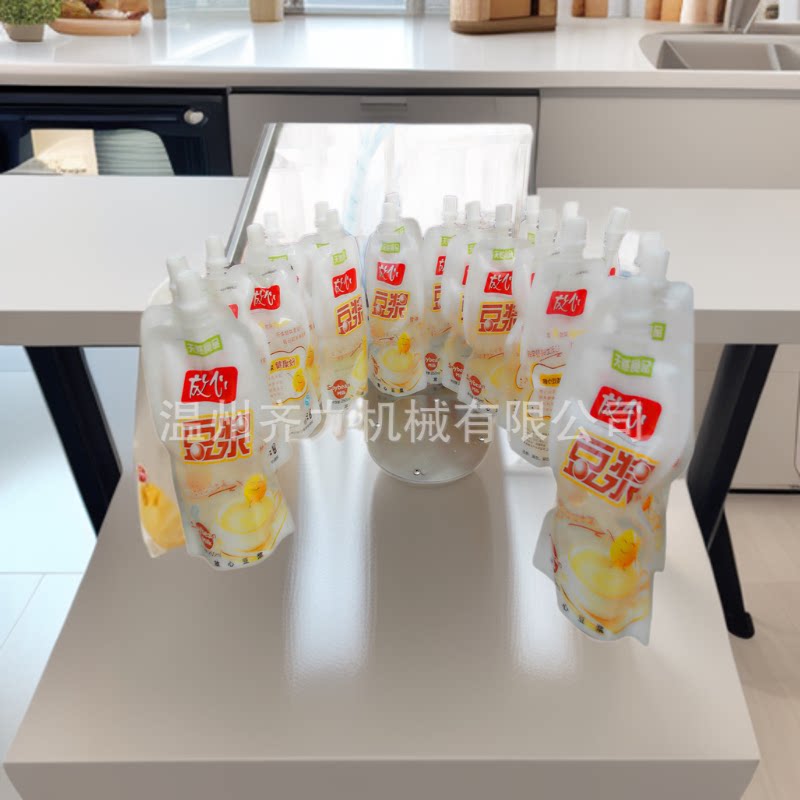 供应手提吸嘴袋自动灌装封口机 自立袋果汁饮品全自动充填旋盖机